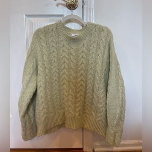 light green sweater